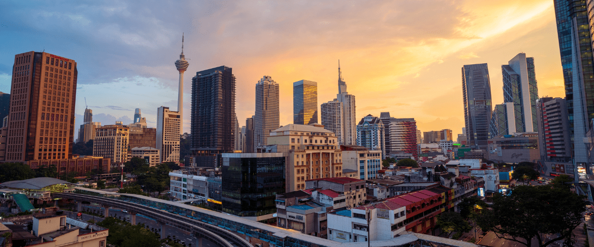 Kuala Lumpur skyline at sunset with KL Tower